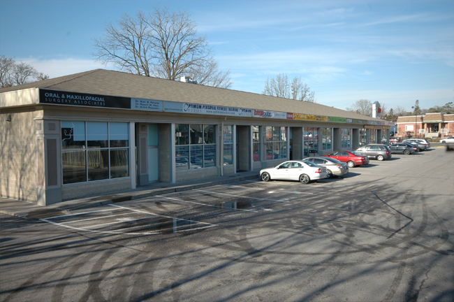 Modern interior with three tables and chairs